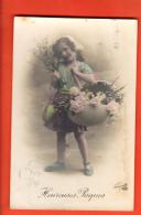 GAPA-04  Joyeuses Pâques  Jeune Fille Avec Oeufs Et Fleurs En Bandoulière. Circulé 1911 - Ostern