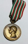 WWI - MEDAGLIA MIGNON - GUERRA ITALO - AUSTRIACA (1915-1918) Bronzo Nemico / Nastro Originale - Italy