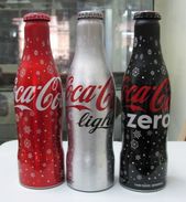 AC - COCA COLA SNOWING ILLUSTRATED 2017 - 2018 NEW YEAR ALUMINUM EMPTY BOTTLES & CROWN CAPS FROM TURKEY - Botellas