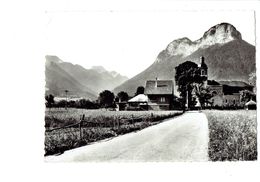 Cpm - 74 - Doussard - L'église Et Le Charbon - - Doussard