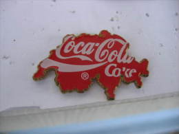 Pin's Coca Cola Coke. Pin's En Forme Du Pays De La Suisse - Coca-Cola