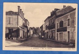 CPA - RISCLE - Rue De Lebrère - Magasin La Ruche Méridionale - Credit Commercial De France - écrite De Ste Lanne - Riscle