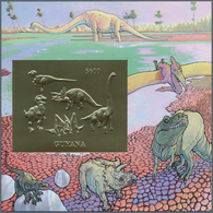 25688 Thematik: Tiere-Dinosaurier / Animals-dinosaur: 1993, Guyana. Lot Of 100 GOLD Dinosaur Blocks Contai - Préhistoriques