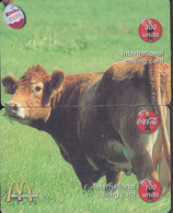 COW PUZZLE OF 2 PHONE CARDS - Mucche