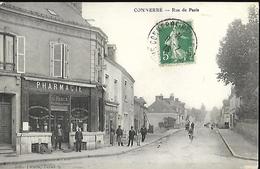 Delcampe - Conneré  Rue De Paris ,Pharmacie L . Farce  CPA 1915 - Connerre