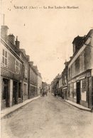 18. CPA.  GRACAY.  Rue Ludovic Martinet.  Commerce Bouchard Arnault, Vetements Rancy. 1943. - Graçay