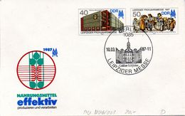 (FC5) DDR Amtl. GZS-Umschlag U 6 40(Pf) Neben 50(Pf) Mehrfarbig "Leipziger Messe 1987" ESSt 10.3.87 - Briefomslagen - Gebruikt