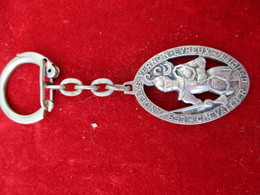 Porte-clés Publicitaire/Opticien / Chevallier/LES ANDELYS/VERNON/EVREUX/ Bronze Estampé Nickelé/Années 60-80   POC355 - Key-rings