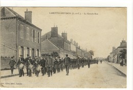 Delcampe - Carte Postale Ancienne Lamotte Beuvron - La Grande Rue - Défilé, Fanfare, Musique - Lamotte Beuvron