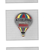 Pin's  Montgolfière  Sur  Publicité  Marque  A  Cap  2000  UNIMETAL  Signé  TOSCA - Montgolfières