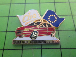 1218c Pin's Pins / Rare Et De Belle Qualité / ARTHUS-BERTRAND : RENAULT CLIO VOITURE DE L'ANNEE 1993 - Arthus Bertrand