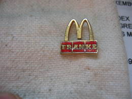 Pin's Mc DONALDS Avec Le Partenaire Franke (Groupe Suisse Producteur D'éviers) - McDonald's