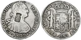 CARLOS IV. 8 Reales. 1802. Lima IJ. Resello Escudo De Portugal (De Mey 1040). Cal-657. Ar. 26,69g. MBC. Rara. - Autres & Non Classés