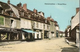 23. CPA. CHENERAILLES.  Grand'rue. Commerce Giry, Café, - Chenerailles