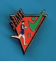 PIN'S  //  ** ATHLETISME / REIMS '91 ** . (Arthus Bertrand Paris) - Arthus Bertrand