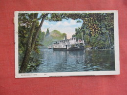 - New York > Adirondack Mts Boat Passing Through Narrows  Fulton Chain Of Lakes Old Forge > Ref 3109 - Adirondack