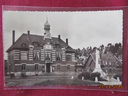 CPSM - Marcoing - Hôtel De Ville Et Monument Aux Morts - Marcoing