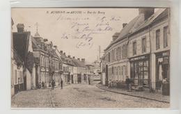 CPA AUBIGNY EN ARTOIS (Pas De Calais) - Rue Du Bourg (avec Ses Commerces) - Aubigny En Artois