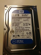 Western Digital WD10EZEX Caviar Blue SATA 3.5' Merevlemez, 1TB, 7200rpm 64M Cache Jó állapotban.
8130 órás Futásidő. - Autres & Non Classés