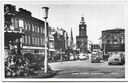 Real Photo Postcard, High Street Dumfries, Shops, Cars, Automobile. - Dumfriesshire