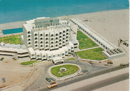 SHARJAH- THE CARLTON HOTEL, CAR, TRUCK, BEACH - United Arab Emirates