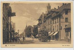 68 SAINT-LOUIS . Rue De Bâle Animée , Tramway ,  édit : C A P , écrite En 1934  , état SUP - Saint Louis