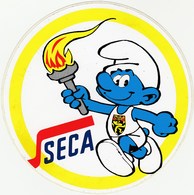 PEYO. Le Schtroumpf Et La Flamme Olympique. RARE Autocollant PUB SECA. Années 80. - Stickers