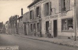 Roissy-en-France.  La Rue De Paris. ( Café Marceau Tabac ) - Roissy En France