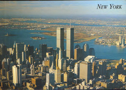 USA  - Postcard Unused  - New York City - The World Trade Center Towering Over Lower Manhattan - World Trade Center