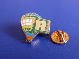 Pin's Montgolfière Avec Logo R Style Celui De La BNP - Zamac (YJ10) - Montgolfières