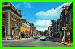 BROCKVILLE, ONTARIO - LOOKING EAST ON PART OF THE MAIN BUSINESS AREA - RIDEAU AIR PHOTOS - ANIMATED WITH OLD CARS - - Brockville