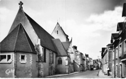 61 - LE MERLERAULT : L'Eglise Et La Grande Rue - CPSM Dentelée Noir Blanc Format CPA - Orne - Le Merlerault