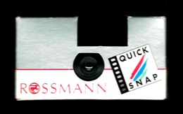 PUBLICITÉS ROSSMANN QUICK SNAP  APPAREIL JETABLE   UTILISÉE IN JAPAN 12 / 94 POIDS 60 GRAMMES - Cameras