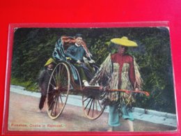 RICKSHAW COOLIE IN RAINCOAT HONG KONG - China (Hongkong)