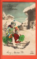 KAC-40 Bonne Année Enfants Sur Une Luge Sur La Neige. Circulé En 1933 Vers Moutier - Neujahr