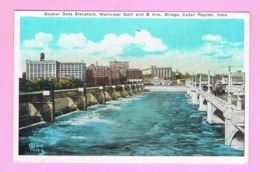 U.S.A. IOWA. CEDAR RAPIDS.  QUAKER OATS ELEVATORS, MUNICIPAL DAM AND B AVE. - Cedar Rapids