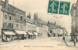 ATTIGNY - Un Côté De La Place Charlemagne. - Attigny