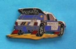 1 PIN'S //   ** PEUGEOT 205 TURBO16 / GRAND RAID / PIONEER / 1989  ** . (Démons & Merveilles) - Rallye