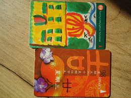 SINGAPORE   USED   2 PHONECARDS  PAINTING - Culture