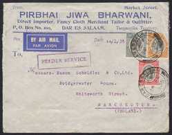 1935  Airmailed Commercial Advert Envelope To Manchester, Franked KGV 15c, 20c (torn) & 50c, Tied DARESSALAAM Date Stamp - Tanganyika (...-1932)