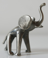 Petite Figurine éléphant Stylisé En Métal Argenté - Autres & Non Classés