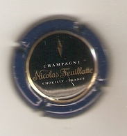 CAPSULE MUSELET CHAMPAGNE NICOLAS FEUILLATTE (or Sur Noir Contour Bleu Marine) - Feuillate