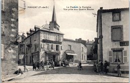 63 - MANZAT -- La Place Et La Fontaine Vue Prise Des Quatre Routes - Manzat