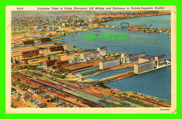 DULUTH, MN - AIRPLANE VIEW OF GRAIN ELEVATORS, LIFT BRIDGE AND ENTRANCE TO DULUTH-SUPERIOR HARBOR - TRAVEL IN 1958 - - Duluth