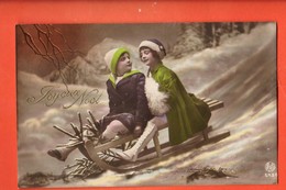 MK-14 Joyeux Noël. Couple Enfants Faisant De La Luge Dans La Neige. Circulé 1920 - Sonstige & Ohne Zuordnung