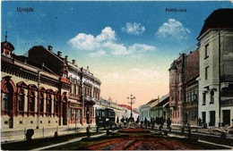 T2 1917 Újvidék, Novi Sad; Petőffy Utca, Villamos, Gyógyszertár. Vasúti Levelezőlapárusítás 55. Sz. 1916. / Street, Tram - Non Classés