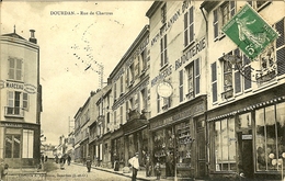 91 DOURDAN RUE DE CHARTRES HOTEL CHASSE CONFECTION RENAULT HORLOGERIE BIJOUTERIE COIFFEUR VENTE DE PARAPLUIES  ANIMEE - Dourdan