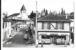 CPA.  CASTETS DES LANDES...RUE DE L'EGLISE..EPICERIE JOURNAUX..TBE VOIR SCAN.. - Castets