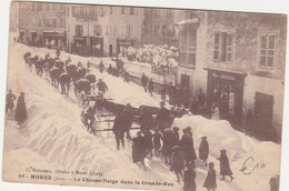 MOREZ    JURA   39- CPA  LE CHASSE NEIGE DANS LA GRANDE RUE - Morez