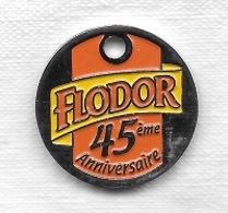 Jeton De Caddie  Marque  Alimentaire  FLODOR  45 ème  Anniversaire  Verso  Vierge  Voir  Description - Jetons De Caddies